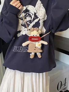 Sac bandoulière en tricot mignon avec lèvres rouges drôles et détail floral pour enfants