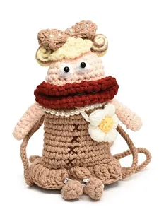 Sac à bandoulière en crochet fait main avec poupée aux cheveux bouclés pour enfants
