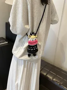 Handmade crochet funny doll crossbody bag with pink lips and yellow curls decor