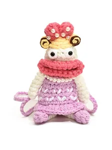 Handmade crochet doll mini crossbody bag with yellow curly hair and pink bow detail