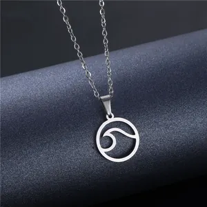 Minimalist stainless steel necklace featuring a hollow round wave pendant on dark blue background
