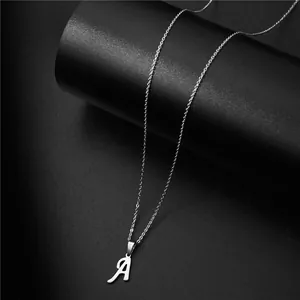 Elegant silver stainless steel necklace with stylized letter A pendant on a thin cross chain