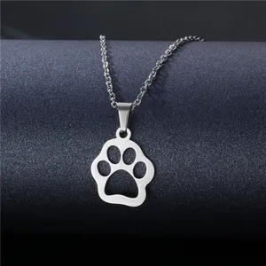 Polished stainless steel necklace featuring a hollow cat paw pendant on a display stand
