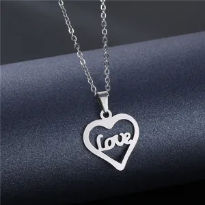 Polished silver stainless steel heart necklace with cursive Love pendant for women