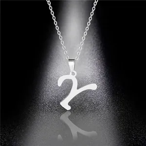 Polished stainless steel necklace featuring a silver number 2 pendant on black surface