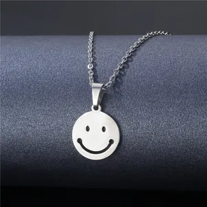 Minimalist stainless steel smiley face pendant necklace with polished silver finish