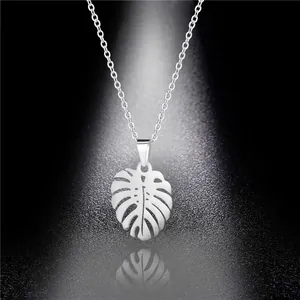 Minimalist stainless steel monstera leaf pendant necklace with elegant mirror reflection