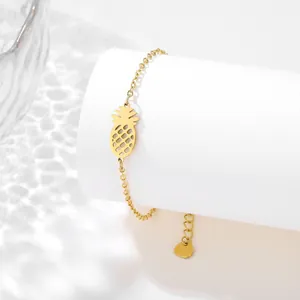 Detail of gold pineapple pendant on stainless steel chain with water ripple light effect
