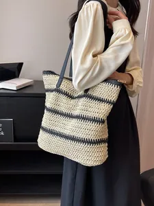 Bohemian woven tote bag with black stripes and leather straps for summer beach travel