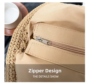Detail view of the durable zipper closure and fabric lining of the woven beach bag