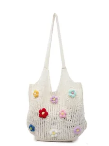 Beige crochet hollow tote bag with colorful 3D floral accents for summer beach style