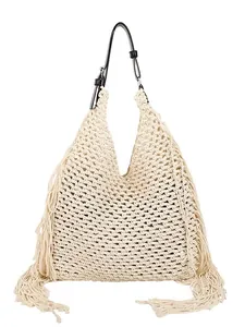 Bohemian style cream woven tassel tote bag with long fringes and adjustable leather strap