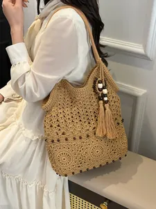 Boho hollow cotton crochet tote bag with tassels and wooden beads for beach travel