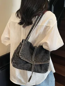 Vintage distressed denim shoulder bag for women with large capacity and metal buckle