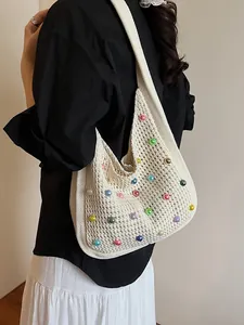 Chic cream knit tote bag with colorful beads and pearl hollow design for summer fashion