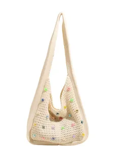 Chic knit tote bag with pearl cutouts and macaron beads for casual beach outings