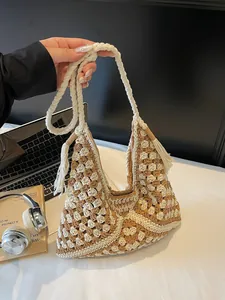 Handmade crochet cotton tote bag with bohemian fringe and woven diamond patterns