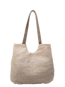 Summer woven straw tote bag with brown faux leather handles for beach vacation style