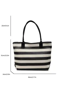 Large black and white striped straw tote bag with dimensions 45x14x31 cm and 23cm handle drop