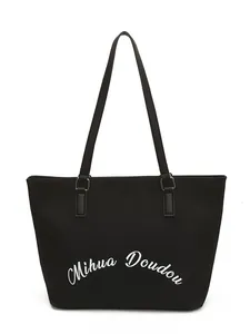 Minimalist black tote bag with white Mihua Doudou lettering and long shoulder straps
