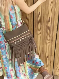 Retro brown fringe crossbody bag with ethnic patterns and silver metal pendants
