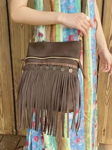 Bohemian rivet fringe crossbody bag in dark brown suede with ethnic woven strap