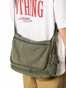 Olive green washed canvas messenger bag for students with adjustable wide shoulder strap
