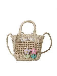 Florale geweven strooien handtas met 'Goodday' patch en ronde handvatten voor strandvakantie