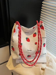 Cute white strawberry print tote bag with red rope handles and Smile text design