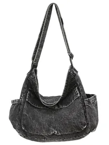 Retro washed denim hobo bag in black with adjustable shoulder strap and multi-pocket design