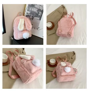 Detail of pink faux fur bunny backpack showing the plush ears and adjustable nylon straps