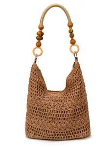 Hollow-out woven hobo tote bag in khaki with wooden beads and ring shoulder strap