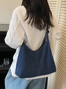 Chic oversized blue denim hobo shoulder bag for women with casual tote design