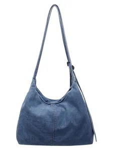 Retro denim hobo shoulder bag with adjustable strap and casual slouchy aesthetic