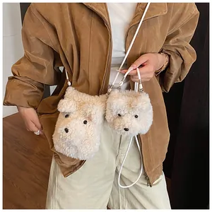 Detail view of plush puppy crossbody bag and round coin purse with soft faux fur texture