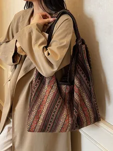 Ethnic bohemian tote bag with colorful embroidery and long shoulder straps for women