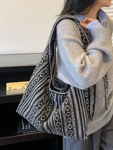 Ethnic knit tote bag with black and white geometric patterns for casual daily use