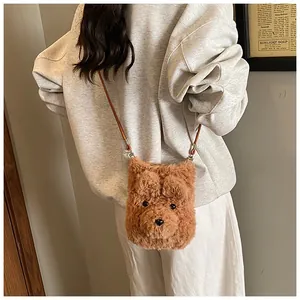 Detailed close-up of brown plush teddy bear crossbody bag with soft faux fur texture