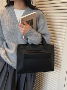 Minimalist black leather business briefcase tote for professional women office commute