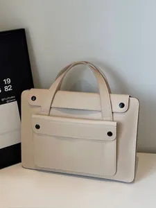 Minimalist beige leather business tote bag for women with front dual-button pocket