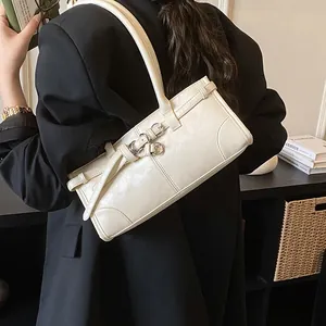 Minimalist off-white rectangle shoulder bag with silver ring buckles and belt decor