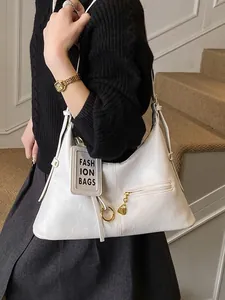 Retro large capacity white underarm crescent tote bag with elegant golden hardware and strap