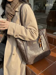 Retro deep brown large tote bag with beaded tassel and polished leather finish