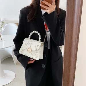 White lace floral embroidery bag with pearl handle and gold chain strap for women