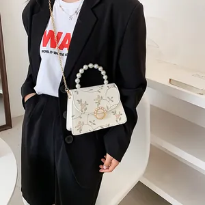 Elegant white lace floral embroidered shoulder bag with pearl handle and gold chain strap