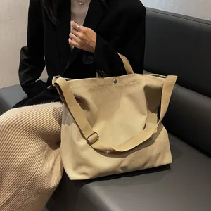 Minimalist large capacity khaki canvas tote bag with adjustable shoulder strap for women