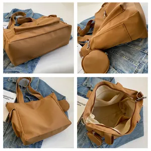 Detail view of khaki canvas tote bag with mini round coin purse and inner pockets