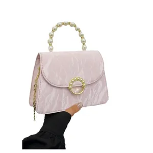 Pink marble pattern crossbody bag with pearl handle and golden chain strap