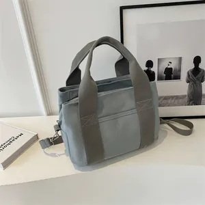 Minimalist morandi blue canvas handbag with adjustable strap for women in high quality