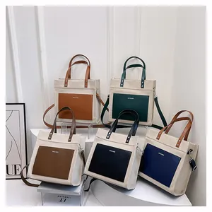 Canvas and leather tote bag collection in five colors with MYCARE logo pocket